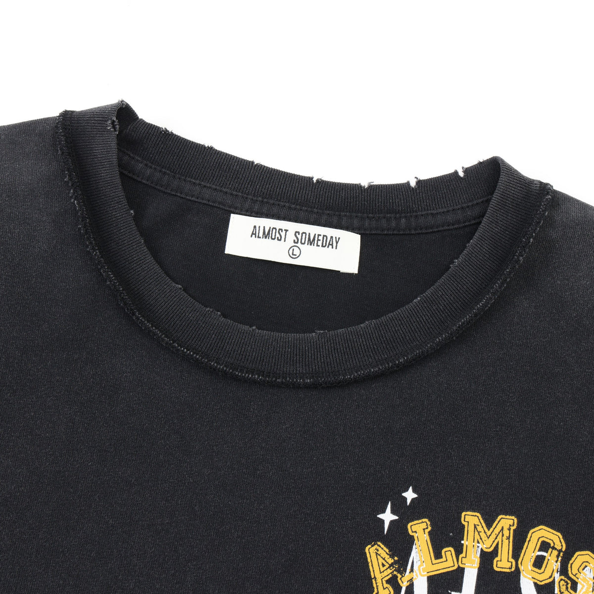 League Tee – Black – Close-up of distressed ribbed crewneck and interior brand label