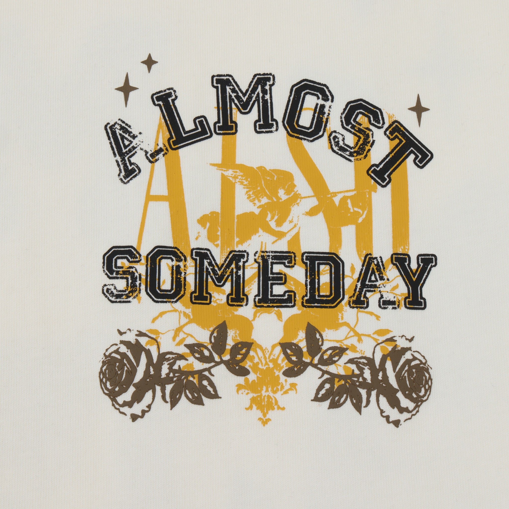 League Tee – Cream – Close-up of chest lettering, cherub, roses, and stars