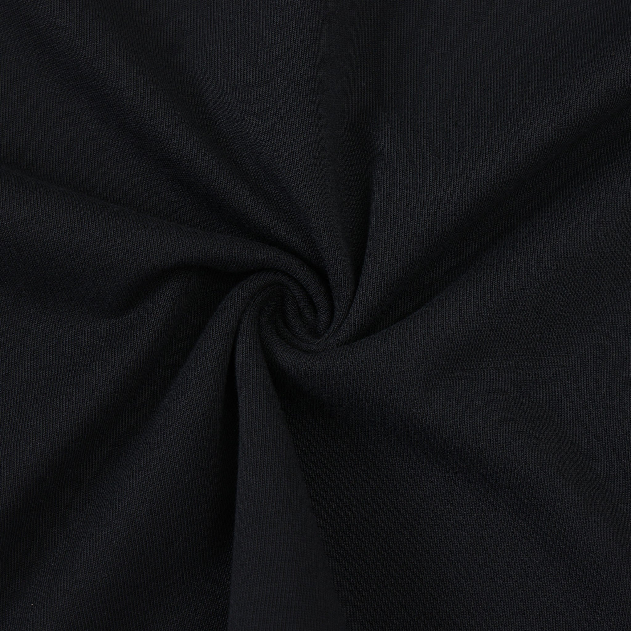 Members Tee – Black – Close-up of black fabric twisted to show texture