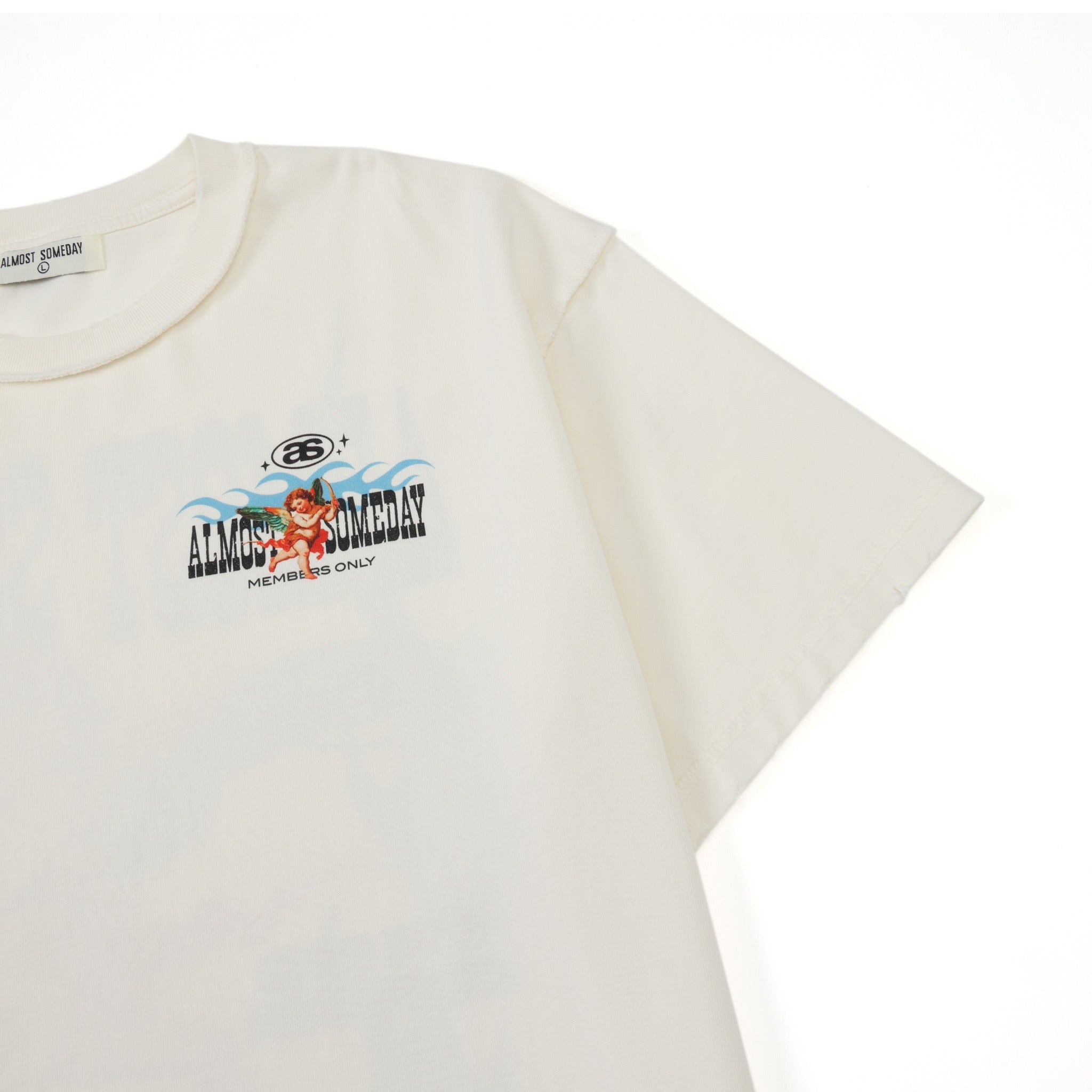 Members Tee – Cream – Angled front detail showing chest artwork and short sleeve