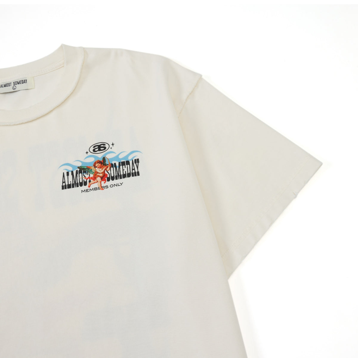Members Tee – Cream – Angled front detail showing chest artwork and short sleeve