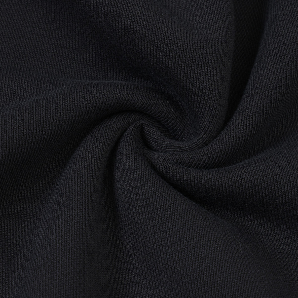 Members Zip Hoodie – Black – Close-up of black fabric twisted to show texture