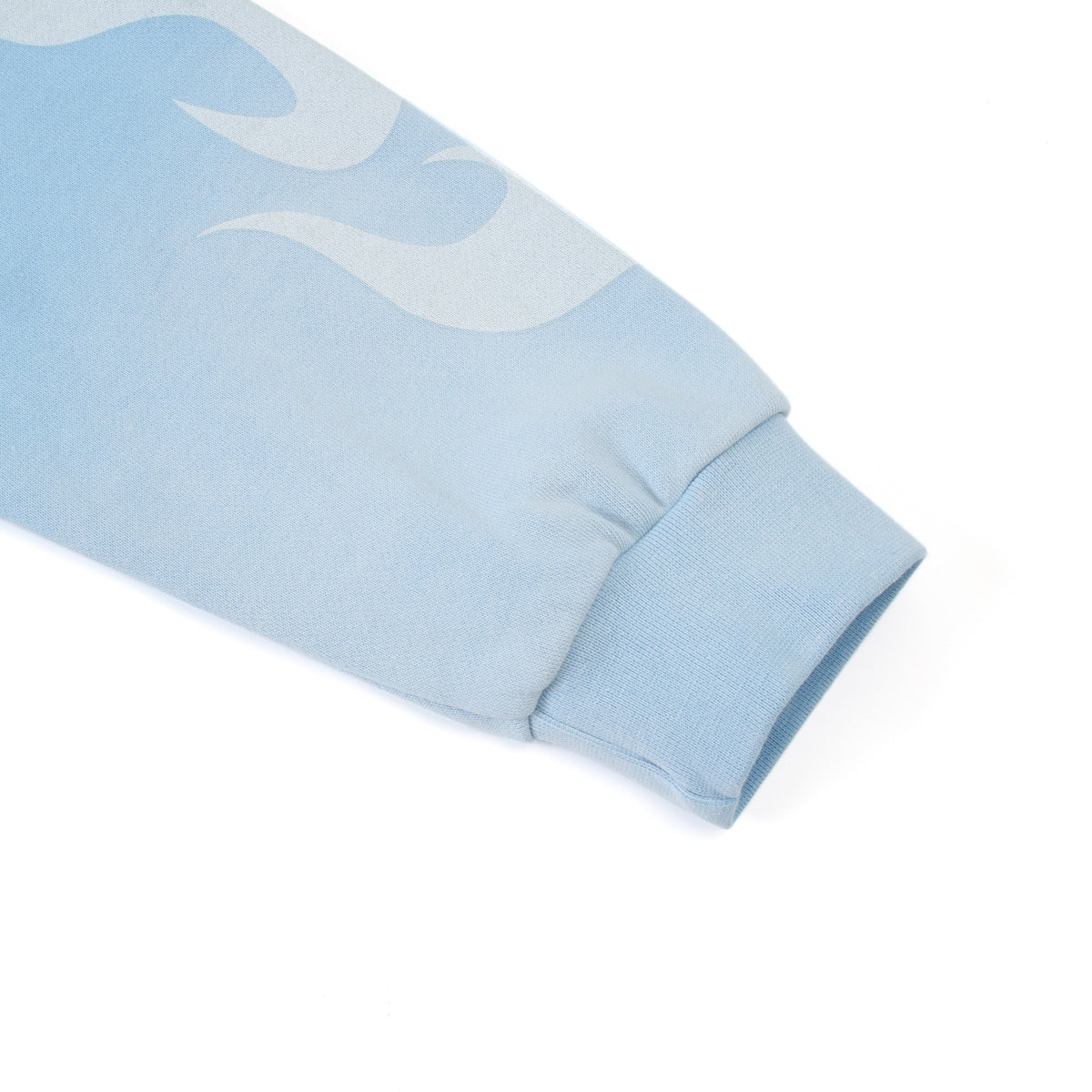 Members Zip Hoodie – Light Blue – Angled close-up of ribbed cuff and white sleeve flame
