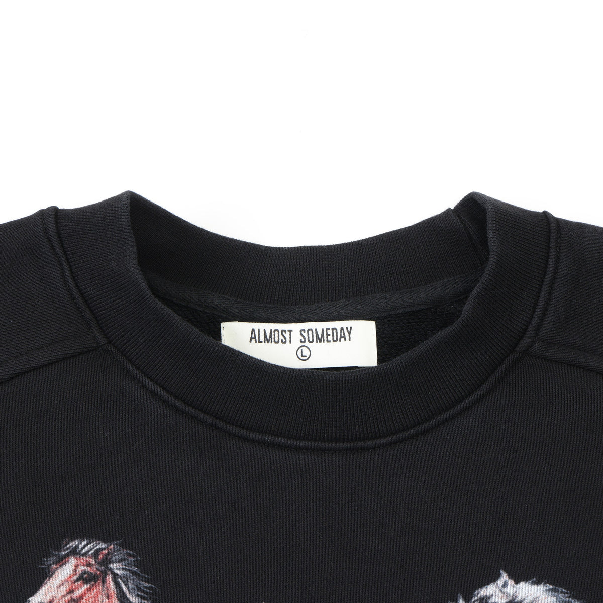 Smoke Crewneck – Black – Close-up of ribbed crew neckline and interior brand label