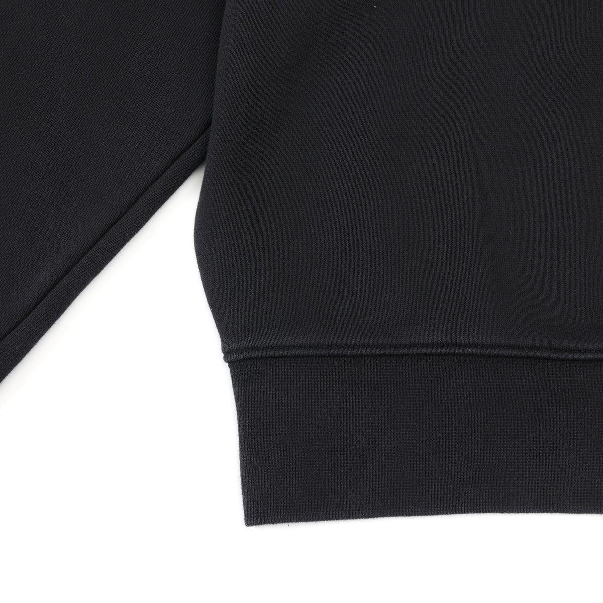 Smoke Crewneck – Black – Close-up of ribbed bottom hem and side seam