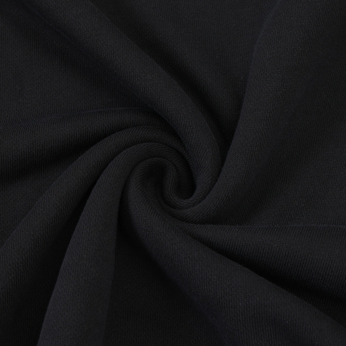 Smoke Crewneck – Black – Close-up of black fabric twisted to show texture