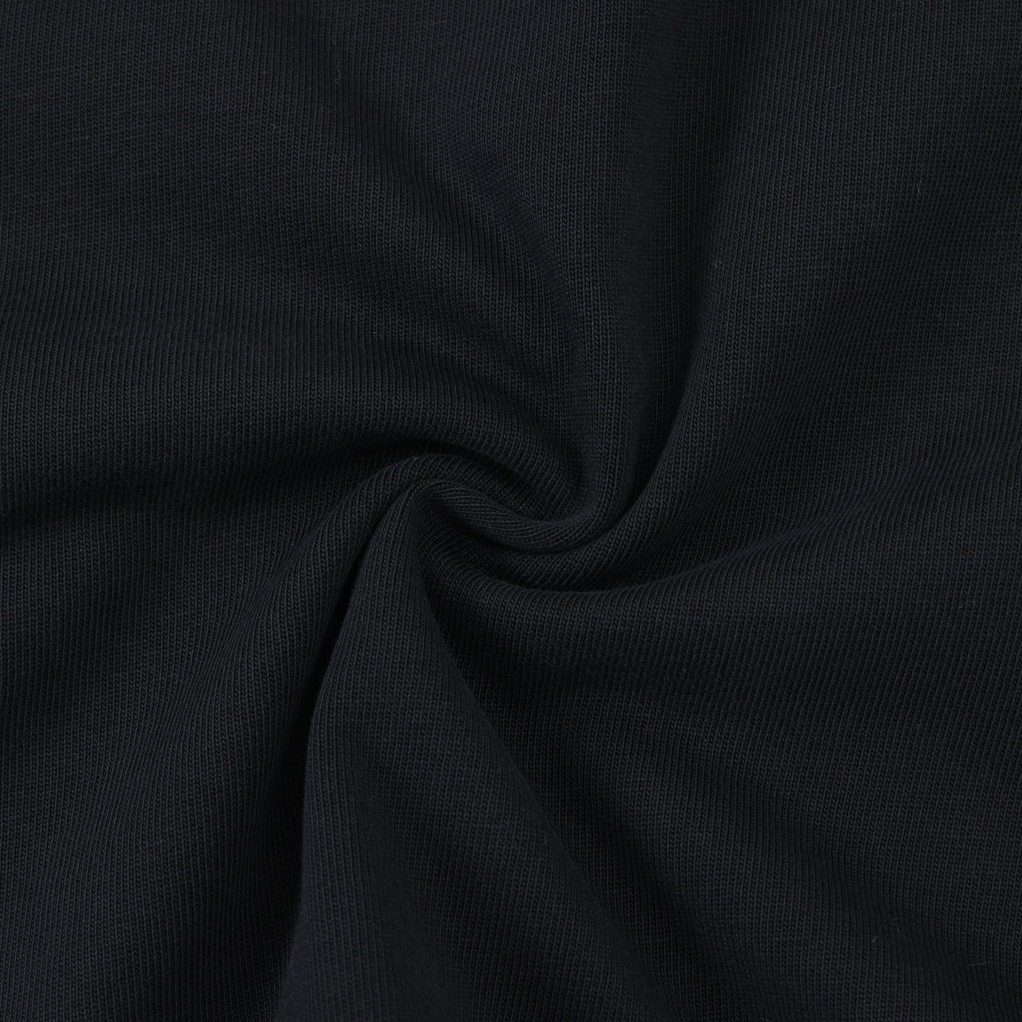 Smoke Tee – Black – Close-up of gathered black fabric showing knit texture