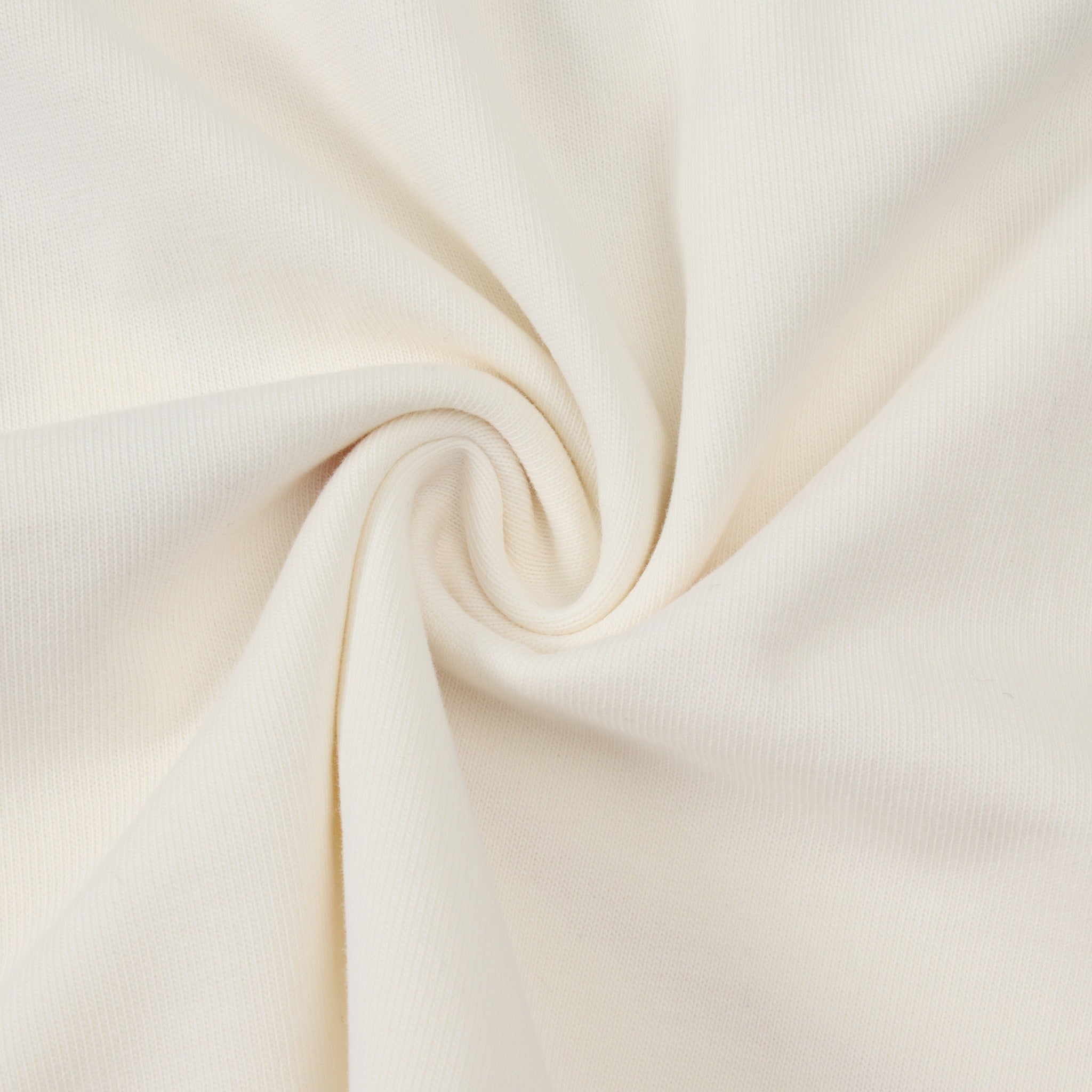 Smoke Tee – Cream – Close-up of gathered cream fabric showing knit texture